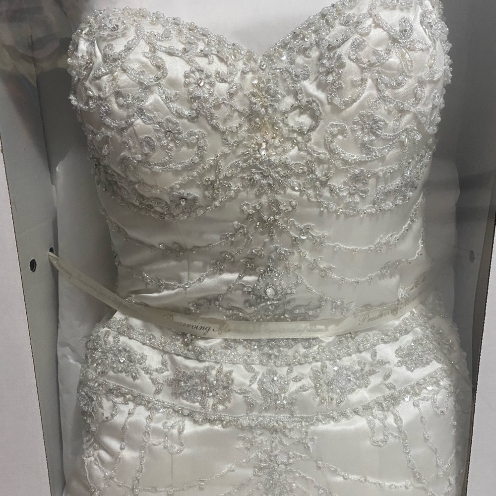 David’s Bridal Fit and Flare, sweetheart gown with all over beading.